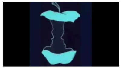 Faces or apple core? Uncover personality traits through this image.